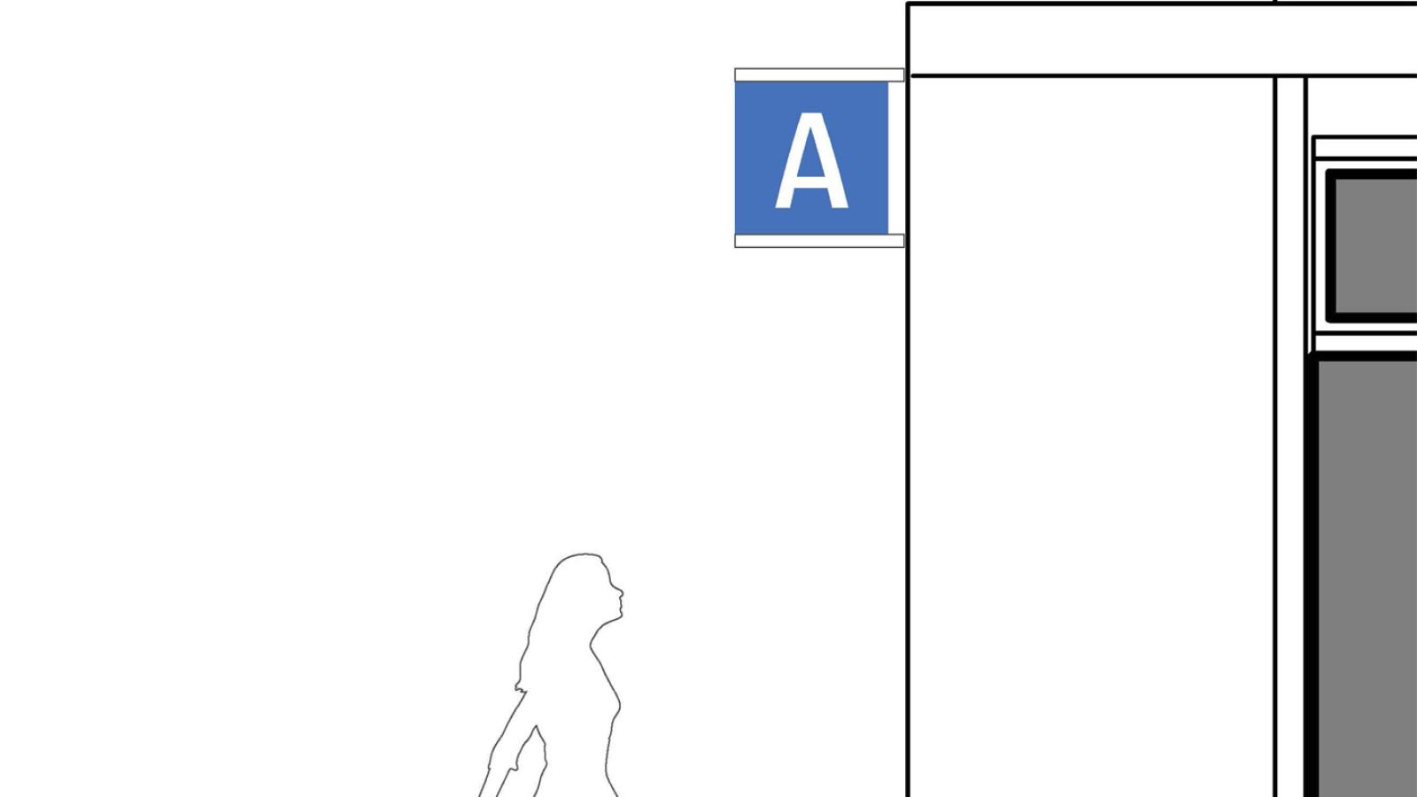 Ein Schild über dem Eingang zeigt ein "A". Die Silhouetten zweier Menschen macht die Proportionen und die Anbringhöhe des Schildes erkennbar.