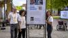 Maximilian Kaske, Sally Amin und Rozsa Simon (v.l.n.r.) von precycle stehen vor ihrem Plakat beim Potsdamer Tag der Wissenschaften 2022